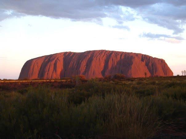 Australian Uluru rock formation at sunset