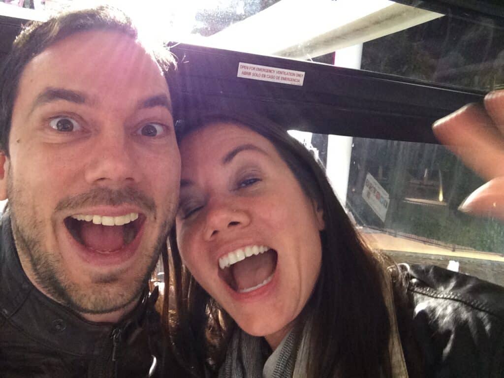man and woman in ferris wheel