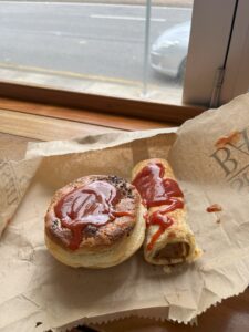 meat pie and sausage roll pastry with tomato sauce