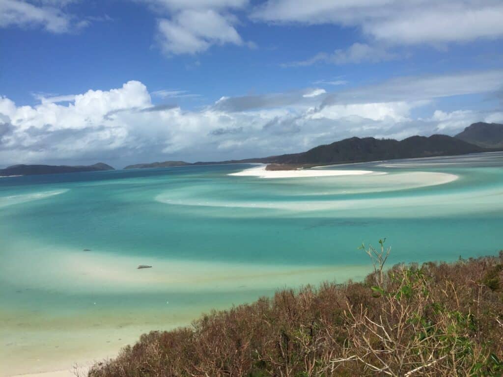 view of green blue water at an inlet in Whitsundays